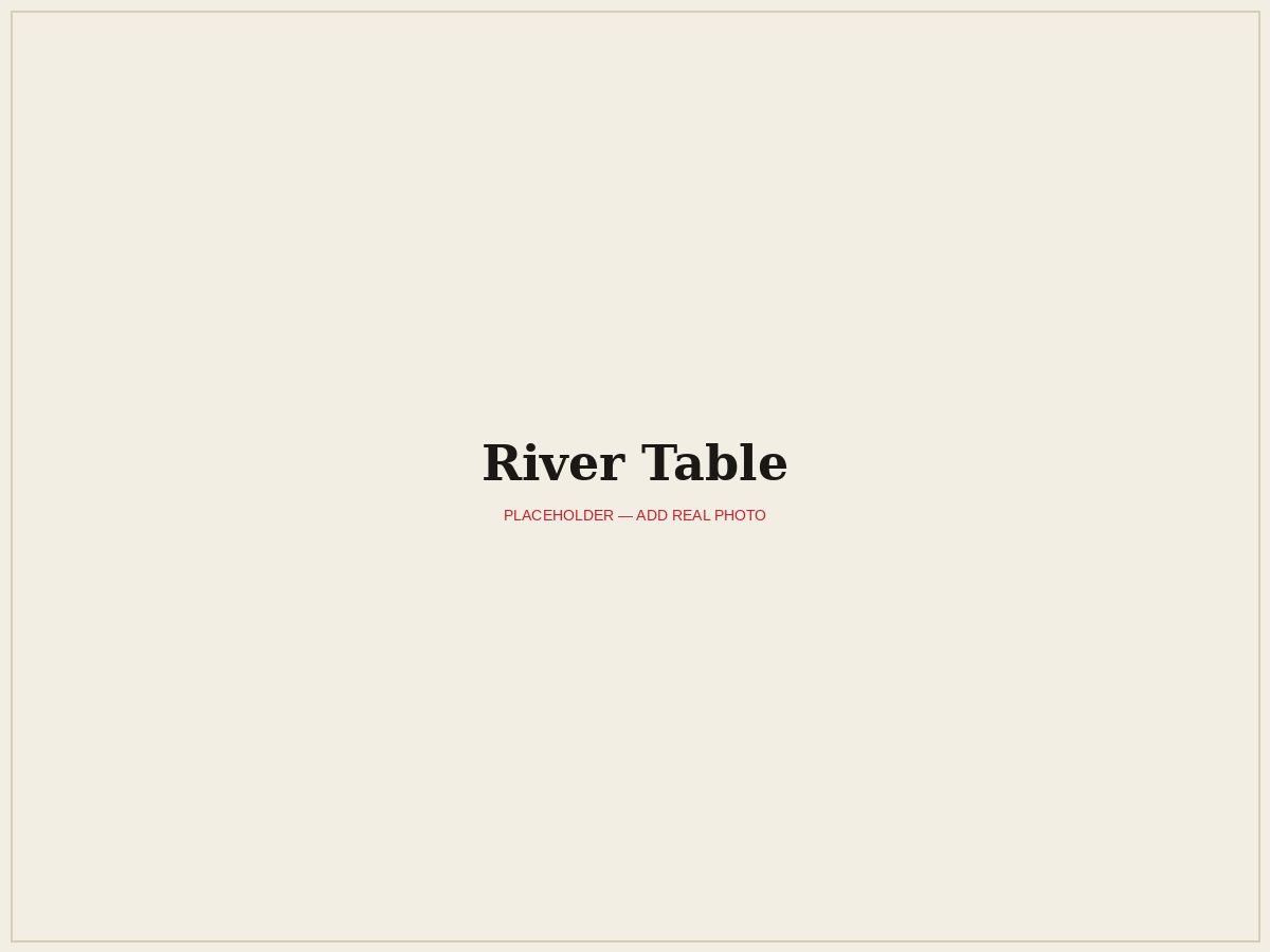 River table by KAXARINO with a hand-poured resin river running through solid wood